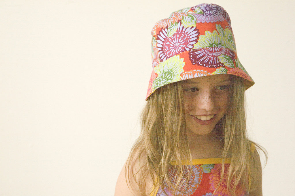girls reversible summer hat in persimmon by Red Thread Design