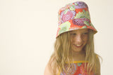 girls reversible summer hat in persimmon by Red Thread Design 